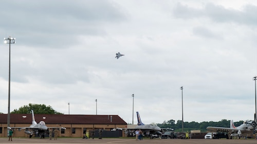 Gathering of Eagles and National Security Forum attendees watch the F-22 Demonstration Team perform during a demonstration at Maxwell Air Force Base, Alabama, May 6, 2026.