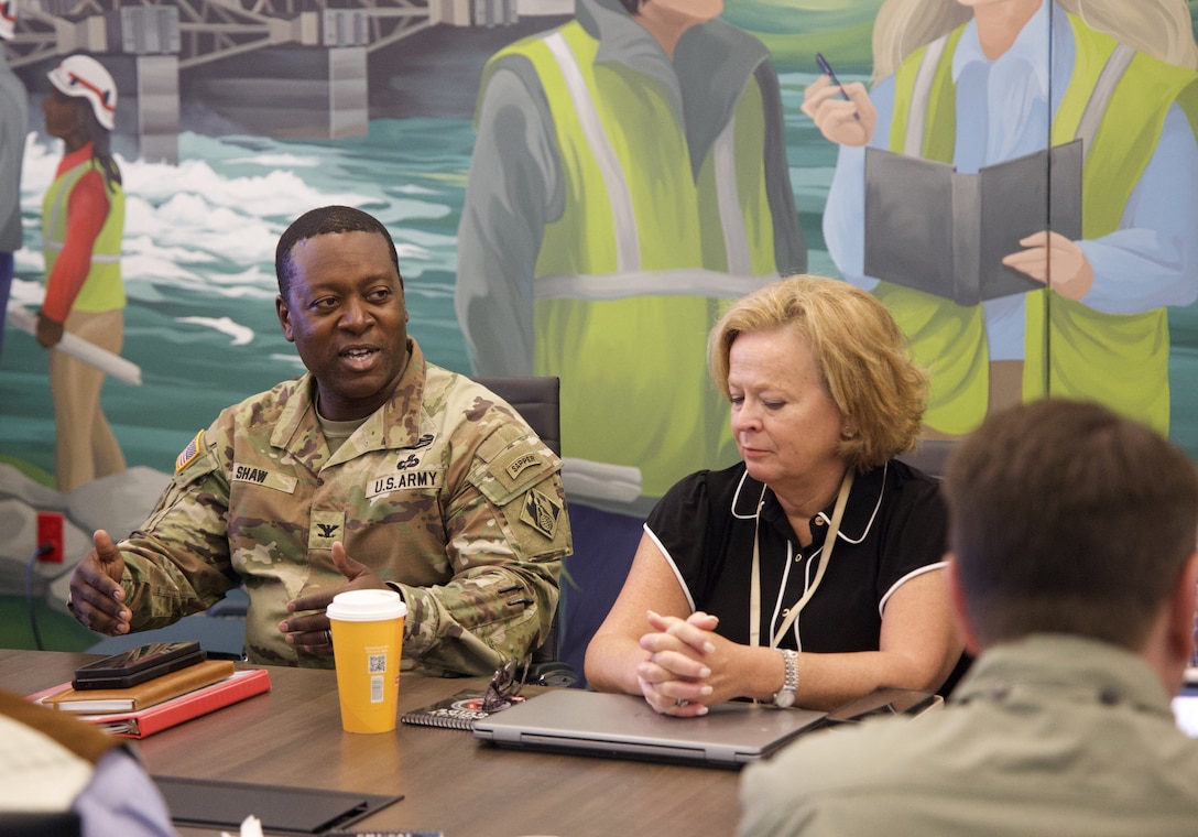 Picture of a COL updating a safety briefing.