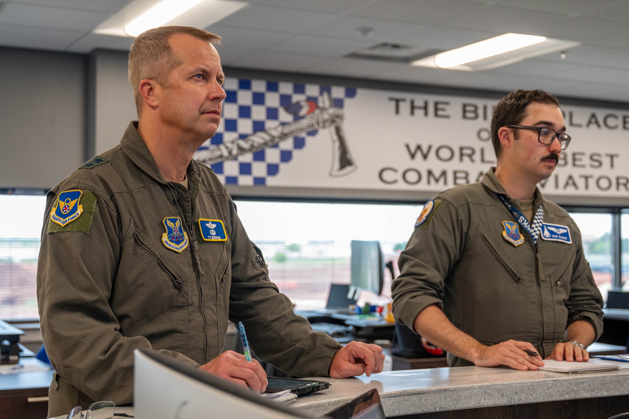 U.S. Air Force Maj. Gen. Ty Neuman, Eighth Air Force and Joint-Global Strike Operations Center commander, receives a step briefing during a visit to Dyess Air Force Base, Texas, May 5, 2026. Neuman toured various facilities across the installation to gain insight into the 7th Bomb Wing's current operational capabilities and the strategic readiness of the B-1B Lancer fleet. (U.S. Air Force photo by Airman 1st Class William Neal)