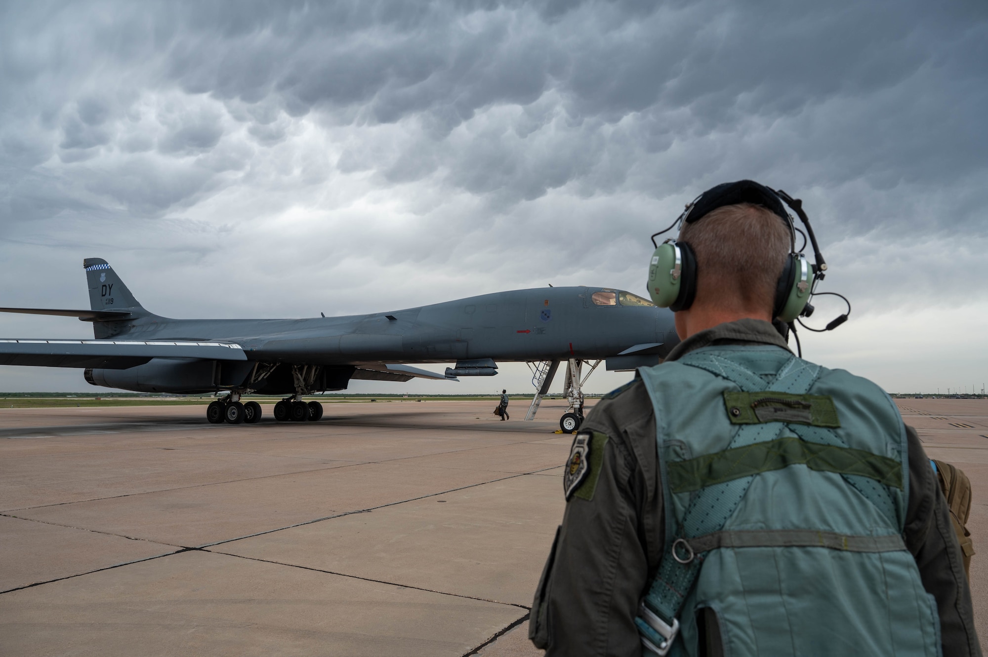 U.S. Air Force Maj. Gen. Ty Neuman, Eighth Air Force and Joint-Global Strike Operations Center commander, prepares to board a B-1B Lancer at Dyess Air Force Base, Texas, May 5, 2026. The engagement highlighted the strategic importance of the B-1B Lancer in providing the Department of War with rapid, flexible and lethal global reach capabilities. (U.S. Air Force photo by Airman 1st Class William Neal)