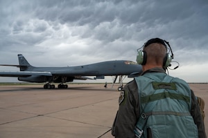 U.S. Air Force Maj. Gen. Ty Neuman, Eighth Air Force and Joint-Global Strike Operations Center commander, prepares to board a B-1B Lancer at Dyess Air Force Base, Texas, May 5, 2026. The engagement highlighted the strategic importance of the B-1B Lancer in providing the Department of War with rapid, flexible and lethal global reach capabilities. (U.S. Air Force photo by Airman 1st Class William Neal)