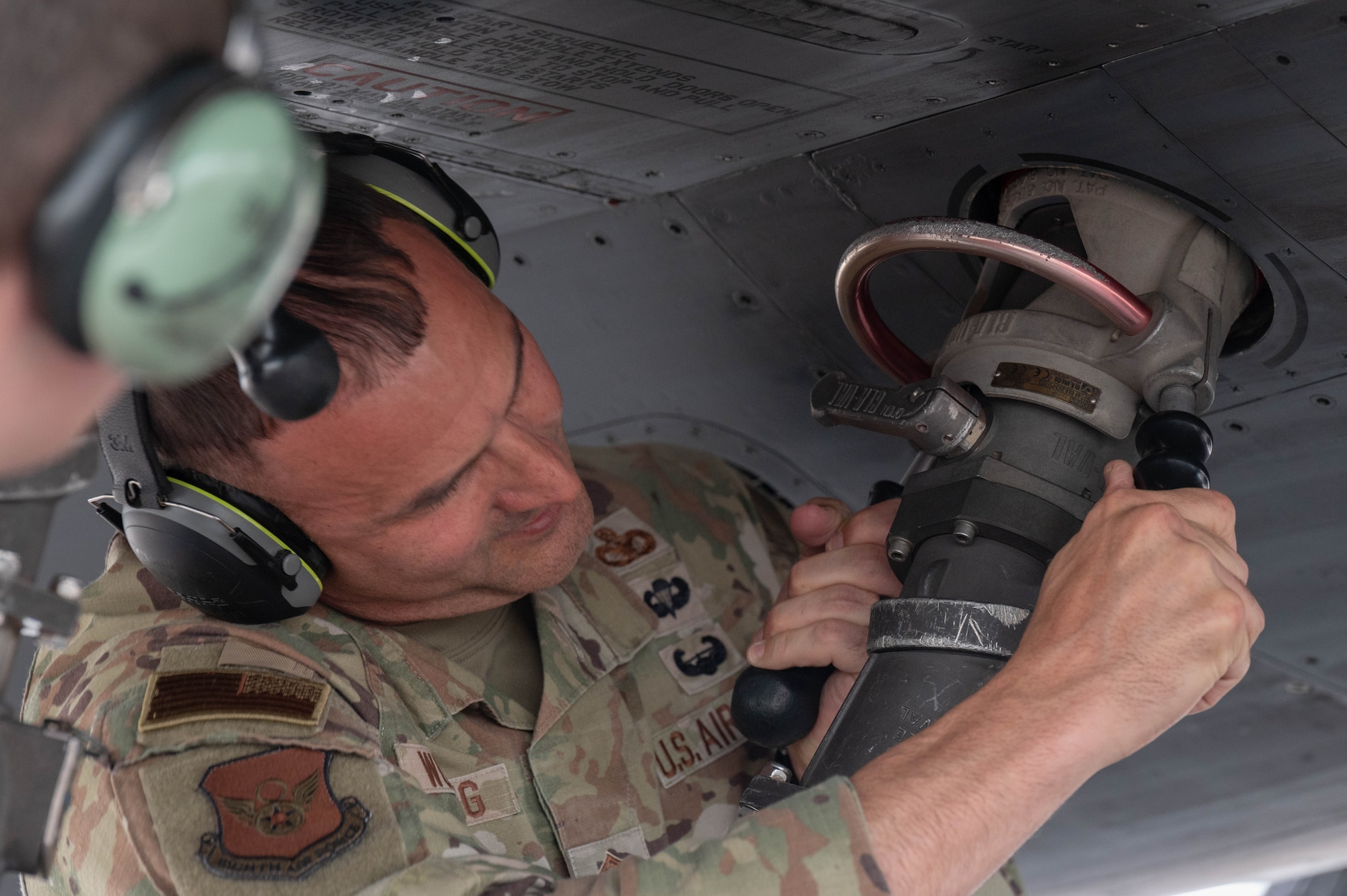 U.S. Air Force Chief Master Sgt. Brandon Wolfgang, Eighth Air Force command chief and Joint-Global Strike Operations Center senior enlisted leader, connects fueling piping to a B-1B Lancer at Dyess Air Force Base, Texas, May 5, 2026.  Wolfgang’s hands-on participation with the 7th Logistics Readiness Squadron highlighted the vital role fuel operations play in sustaining the long-range capabilities of the strategic bomber fleet.  (U.S. Air Force photo by Airman 1st Class William Neal)
