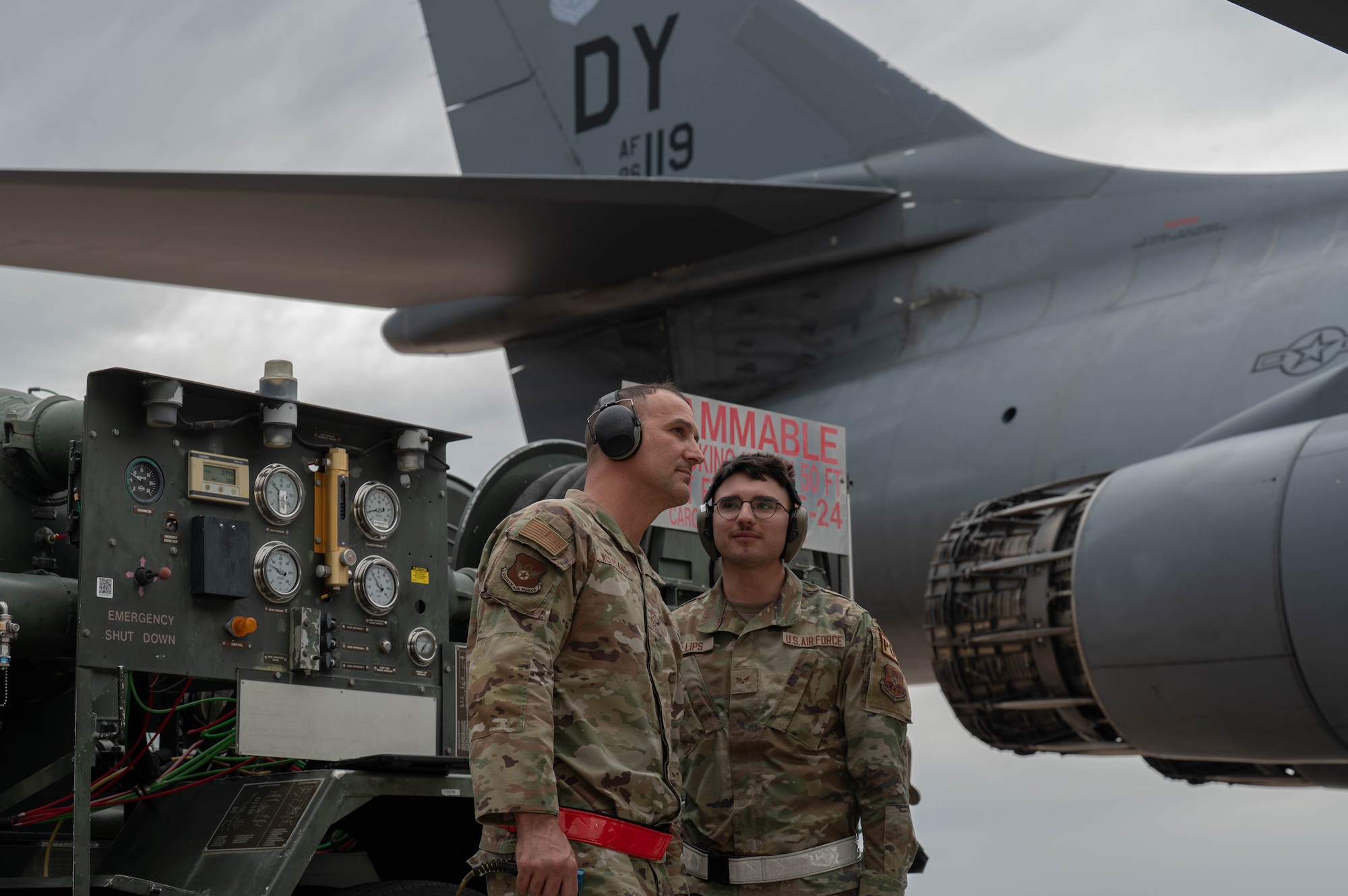 U.S. Air Force Chief Master Sgt. Brandon Wolfgang, Eighth Air Force command chief and Joint-Global Strike Operations Center senior enlisted leader, left, and Senior Airman Random Phillips, 7th Logistics Readiness Squadron fuels distribution operator, prepare a B-1B Lancer for flight at Dyess Air Force Base, Texas, May 5, 2026.  The interaction gave Wolfgang direct insight from frontline Airmen into the technical demands and challenges of sustaining B-1B lancer flightline operations. (U.S. Air Force photo by Airman 1st Class William Neal)