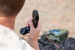 A 353rd Special Operations Wing Air Commando awaits an incoming cross-country high frequency communications call on an AN/PRC-167 radio during an Air Force Special Operations Command tactical communicator course hosted by the 137th SOW at John W. Nichols Scout Ranch, Oklahoma City, March 31, 2026. With each iteration of the course, AFSOC adapts and shapes expeditionary communications Air Commandos assigned to wings across the globe for mission success within special operations. (U.S. Air National Guard photo by Staff Sgt. Erika Chapa)