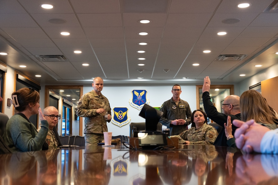 Community Leadership Institute (CLI) members are briefed by U.S. Air Force Col. Matthew Crosman, 91st Missile Wing deputy commander, and U.S. Air Force Col. Thomas Taylor, 5th Bomb Wing deputy commander, at Minot Air Force Base, North Dakota, April 30, 2026. The CLI is an eight-week program designed to showcase to local community leaders everything Minot has to offer. (U.S. Air Force photo by Airman Ben Selchow)