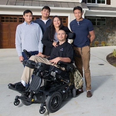 The Avila family poses for a photo.