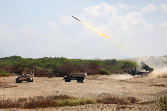 A Japan Ground Self-Defense Force Type 88 Surface-to-Ship Missile System assigned to 1st Artillery Brigade, fires while positioned next to a Navy-Marine Expeditionary Ship Interdiction System and Marine Air-Defense Integrated System, both with 3rd Marine Littoral Regiment, 3rd Marine Division, at a joint task force maritime strike event during Exercise Balikatan 2026 at Paoay Sand Dunes, Philippines, May 6, 2026.