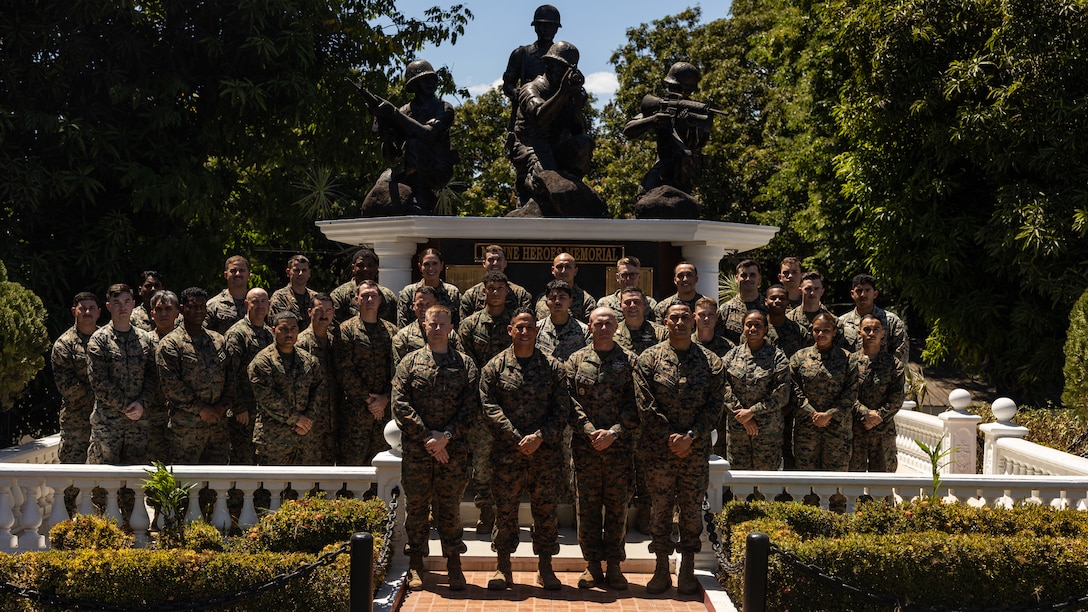 From left, U.S. Marine Corps Col. Robert  Bunn, deputy commanding officer of the Marine Air-Ground Task Force for Exercise Balikatan 2026, Brig. Gen. Omar  Randall, commanding general of the MAGTF for Exercise Balikatan 2026, Navy Command Master Chief Casey  Wheeler, senior enlisted leader of the MAGTF for Exercise Balikatan 2026, and Master Gunnery Sgt. Rene Camarillo, senior enlisted leader of the MAGTF for Exercise Balikatan 2026 command element, pose for a photo with Marines and Sailors with the command element for the MAGTF for Exercise Balikatan 2026 on Fort Bonifacio, Philippines, May 7, 2026. Balikatan is a longstanding annual exercise between the Armed Forces of the Philippines and U.S. military that represents the strength of our alliance, improves our capable combined force, and demonstrates our commitment to regional peace and prosperity. (U.S. Marine Corps courtesy photo by 1st Lt. Chase Colin)