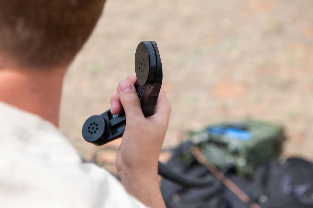 A 353rd Special Operations Wing Air Commando awaits an incoming cross-country high frequency communications call on an AN/PRC-167 radio during an Air Force Special Operations Command tactical communicator course hosted by the 137th SOW at John W. Nichols Scout Ranch, Oklahoma City, March 31, 2026. With each iteration of the course, AFSOC adapts and shapes expeditionary communications Air Commandos assigned to wings across the globe for mission success within special operations. (U.S. Air National Guard photo by Staff Sgt. Erika Chapa)