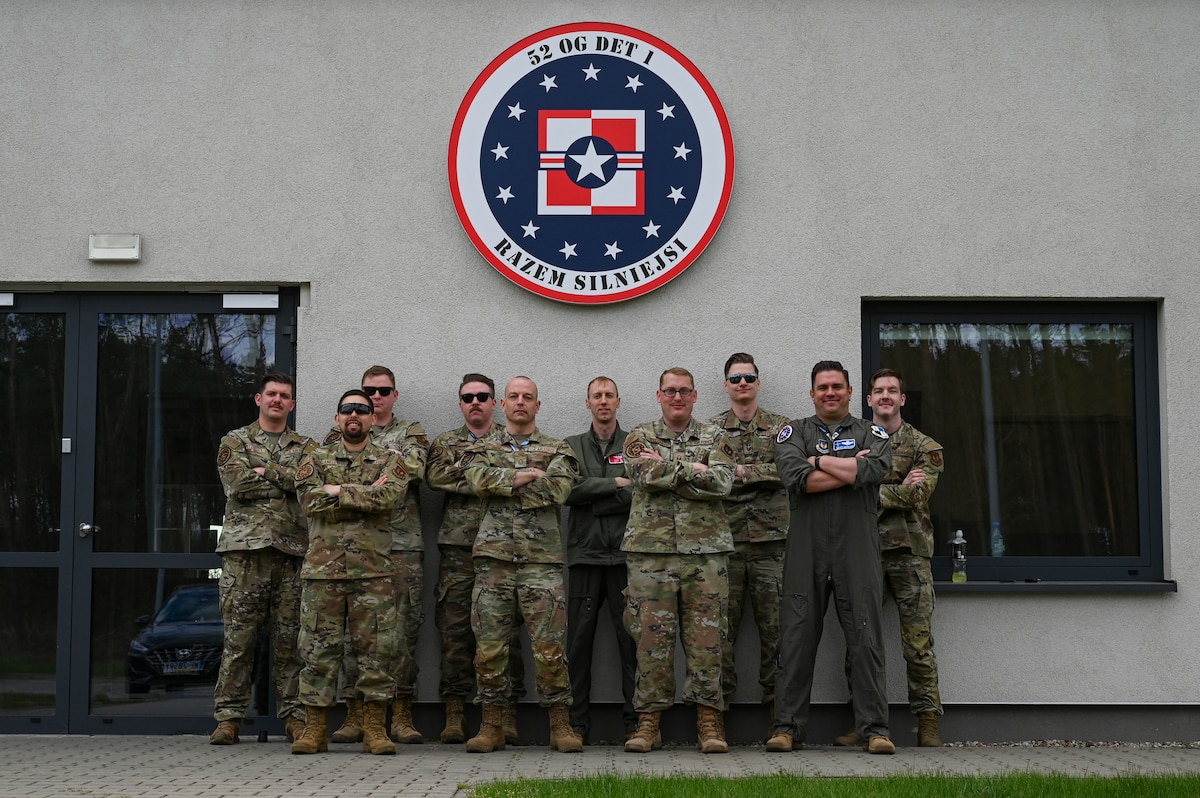 U.S. Air Force Airmen assigned to the 52nd Operations Group, Detachment 1, pose for a photo during Hussar Saber 26-1.