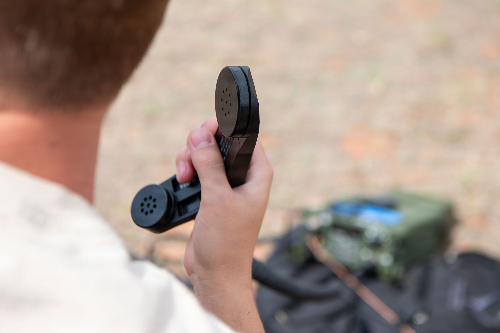 A 353rd Special Operations Wing Air Commando awaits an incoming cross-country high frequency communications call on an AN/PRC-167 radio during an Air Force Special Operations Command tactical communicator course hosted by the 137th SOW at John W. Nichols Scout Ranch, Oklahoma City, March 31, 2026. With each iteration of the course, AFSOC adapts and shapes expeditionary communications Air Commandos assigned to wings across the globe for mission success within special operations. (U.S. Air National Guard photo by Staff Sgt. Erika Chapa)
