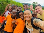 Cpt. Kyle Smith, Sergeant First Class Jacob Ogle and Master Sgt Tatiana combat medic, Landstuhl Regional Medical Center, enjoying a Ghana cultural day excursion around the countryside during the medical readiness exercises in Ghana. Through GHE  the program, U.S. medical personnel work alongside counterparts across Europe and Africa in collaborative exchanges designed to share knowledge and skills in both directions.
