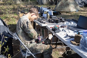 U.S. Soldiers from the 1st Squadron, 2d Cavalry Regiment assemble and tests drones
