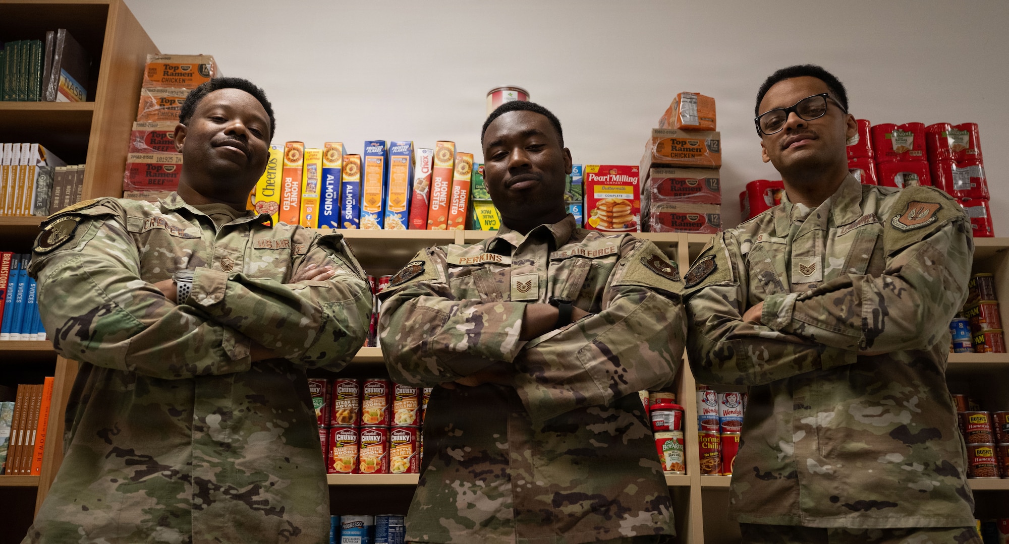 Airmen pose for a photo.