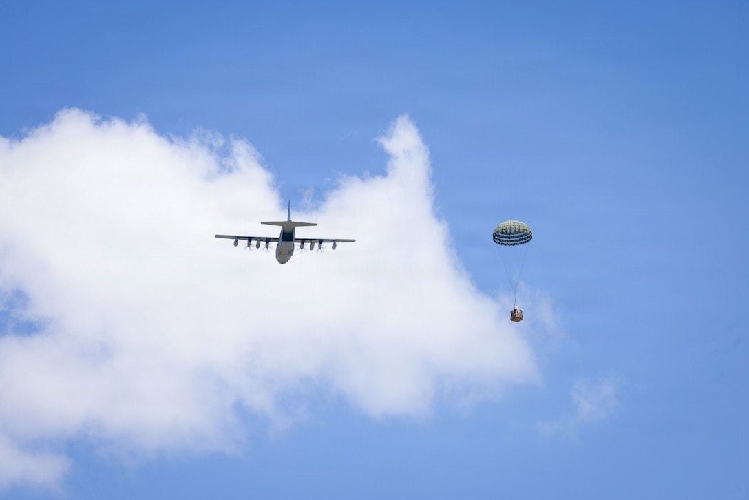 A U.S. Marine Corps KC130J Super Hercules assigned to Marine Aerial Refueler Transport Squadron 252, Marine Aircraft Group 14, 2nd Marine Aircraft Wing, drops a resupply crate during an air delivery training as part of a battalion field exercise at Marine Corps Base Camp Lejeune, North Carolina, May 5, 2026. Combat Logistics Battalion 22 conducted the field exercise to test the battalions combat readiness for the upcoming Marine Corps Combat Readiness Evaluation and set the conditions for successful integration as the Logistics Combat Element for the 26th Marine Expeditionary Unit. (U.S. Marine Corps photo by Lance Cpl. Isabelle Veillette)