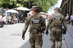 Louisiana National Guard Soldiers conduct a roving patrol as part of Task Force NOLA operations during French Quarter Fest. The Louisiana National Guard activated approximately 120 Soldiers under Task Force NOLA to support enhanced security operations in the French Quarter, contributing to the safety and success of the French Quarter Festival and New Orleans Jazz & Heritage Festival.