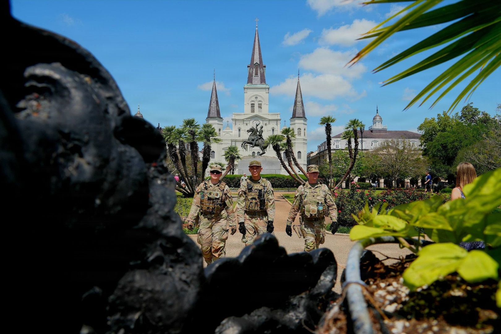 Louisiana National Guard Soldiers conduct a roving patrol as part of Task Force NOLA operations during French Quarter Fest.