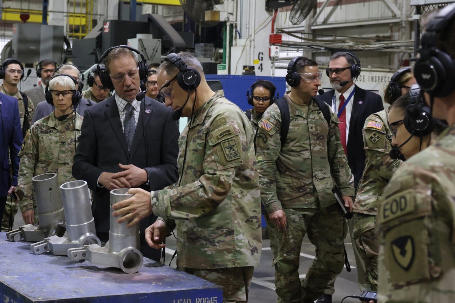 Gen. Christopher LaNeve, Vice Chief of the Staff of the Army, inspects a PATRIOT system antenna mount as Dale McClanahan, Letterkenny Army Depot Product Assurance director, explains LEAD’s capability to overcome obsolete supply chains with an improved design that increases the reliability of systems, during a tour of the depot on April 2.