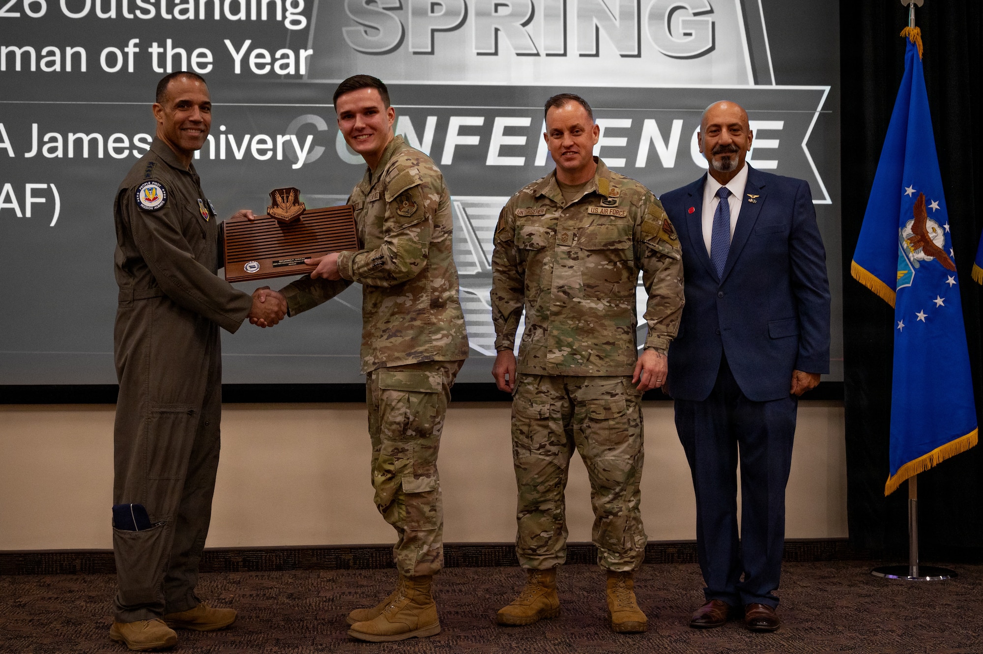 U.S. Air Force Senior Airman James P. Shivery, 9th Air Force, receives the Airman of the year award during the 2026 Air Combat Command’s Outstanding Airmen of the Year Award ceremony at Joint Base Langley-Eustis,  Virginia, May 6, 2026. Winners were selected for their invaluable mission impact and their exemplification of the Air Force core values of integrity, service, and excellence. (U.S. Air Force photo by Staff Sgt. Michael Bowman)
