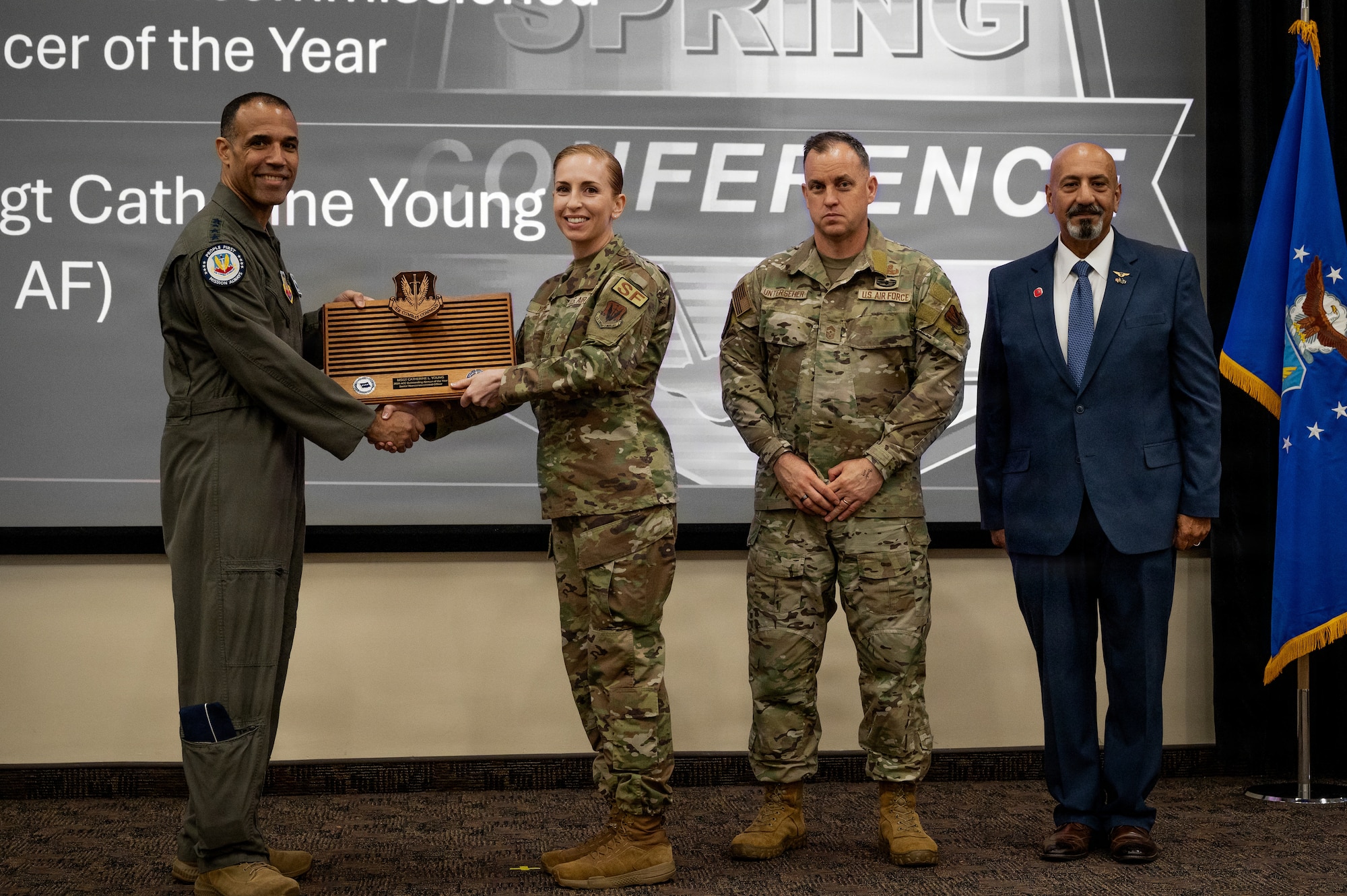 U.S. Air Force Master Sgt. Catherine L. Young, 4th Security Forces Squadron, receives the Senior Noncommissioned Officer of the year award during the 2026 Air Combat Command’s Outstanding Airmen of the Year Award ceremony at Joint Base Langley-Eustis, Virginia, May 6, 2026. Winners were selected for their invaluable mission impact and their exemplification of the Air Force core values of integrity, service, and excellence. (U.S. Air Force photo by Staff Sgt. Michael Bowman)