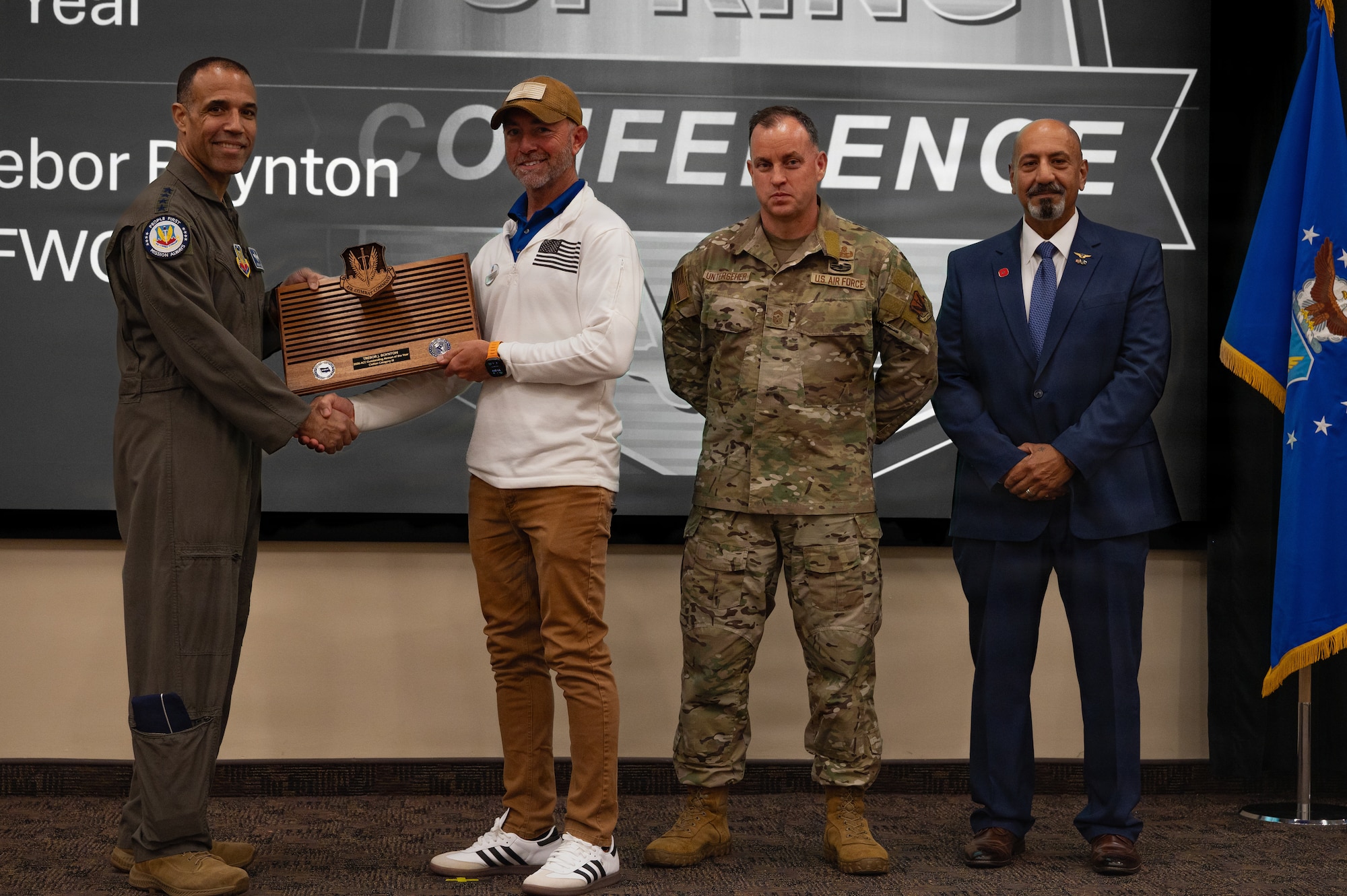 Mr. Trebor J. Boynton, 513th Electronic Warfare Squadron, receives the Civilian Category III of the year award during the 2026 Air Combat Command’s Outstanding Airmen of the Year Award ceremony at Joint Base Langley-Eustis, Virginia, May 6, 2026. Department of the Air Force civilians provide technical expertise and continuity to the total force. (U.S. Air Force photo by Staff Sgt. Michael Bowman)