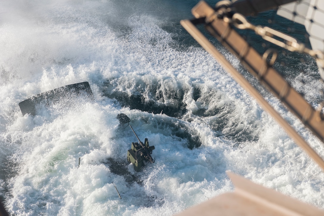 U.S. Marine Corps amphibious combat vehicles with 3rd Assault Amphibian Battalion, 1st Marine Division, I Marine Expeditionary Force, launch from amphibious transport dock ship USS Somerset (LPD 25) for open ocean launch drills during Quarterly Underway Amphibious Readiness Training 25.2 while underway in the Pacific Ocean, March 9, 2025. QUART is a joint training exercise designed to develop and sustain essential amphibious readiness skills for effective operations in maritime environments while reinforcing the Navy-Marine Corps partnership. (U.S. Marine Corps photo by Gunnery Sgt. Stephanie Cervantes)