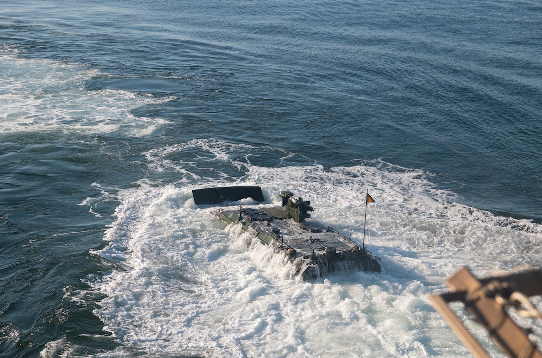 U.S. Marine Corps amphibious combat vehicles with 3rd Assault Amphibian Battalion, 1st Marine Division, I Marine Expeditionary Force, launch from amphibious transport dock ship USS Somerset (LPD 25) for open ocean launch drills during Quarterly Underway Amphibious Readiness Training 25.2 while underway in the Pacific Ocean, March 9, 2025. QUART is a joint training exercise designed to develop and sustain essential amphibious readiness skills for effective operations in maritime environments while reinforcing the Navy-Marine Corps partnership. (U.S. Marine Corps photo by Gunnery Sgt. Stephanie Cervantes)