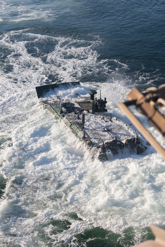 U.S. Marine Corps amphibious combat vehicles with 3rd Assault Amphibian Battalion, 1st Marine Division, I Marine Expeditionary Force, launch from amphibious transport dock ship USS Somerset (LPD 25) for open ocean launch drills during Quarterly Underway Amphibious Readiness Training 25.2 while underway in the Pacific Ocean, March 9, 2025. QUART is a joint training exercise designed to develop and sustain essential amphibious readiness skills for effective operations in maritime environments while reinforcing the Navy-Marine Corps partnership. (U.S. Marine Corps photo by Gunnery Sgt. Stephanie Cervantes)