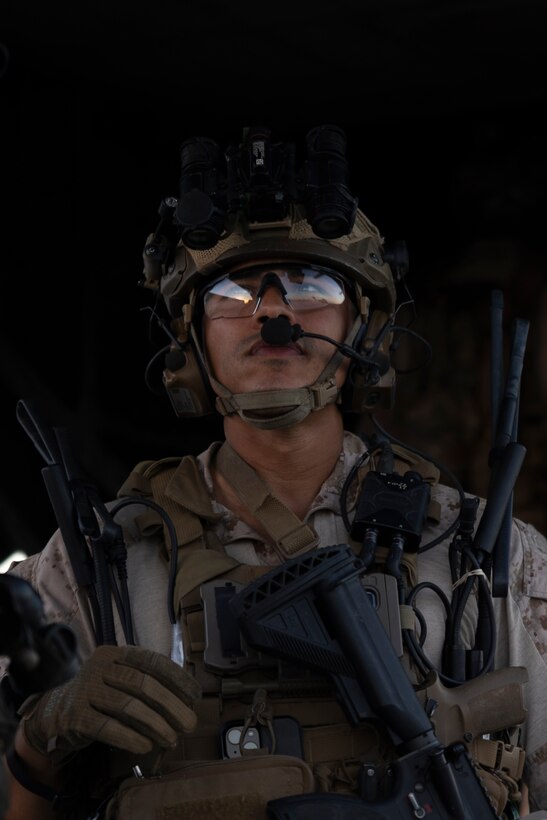 U.S. Marine Corps Capt. Nathaniel Armendariz, a platoon commander with the Maritime Raid Force, 11th Marine Expeditionary Unit, oversees the embarkation of Marines and Sailors onto an MV-22B Osprey during Realistic Urban Training at Marine Corps Air Station Yuma, Arizona, Nov. 10, 2025. RUT is a land-based training exercise that enables the 11th MEU to conduct expeditionary operations as a cohesive Marine Air-Ground Task Force in preparation for amphibious operations alongside the U.S. Navy. (U.S. Marine Corps photo by Cpl. Oliver Nisbet)