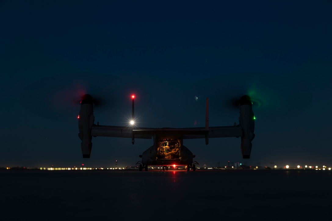 U.S. Marines and Sailors with the Maritime Raid Force, 11th Marine Expeditionary Unit, board an MV-22B Osprey during Realistic Urban Training at Marine Corps Air Station Yuma, Arizona, Nov. 10, 2025. RUT is a land-based training exercise that enables the 11th MEU to conduct expeditionary operations as a cohesive Marine Air-Ground Task Force in preparation for amphibious operations alongside the U.S. Navy. (U.S. Marine Corps photo by Cpl. Oliver Nisbet)