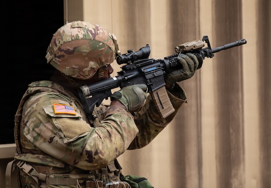 U.S. Army Spc. Sorel Djomou, a supply specialist representing the Marietta-based 201st Regional Support Group, Georgia Army National Guard, takes aim at his target during the Urban Assault event of the 2026 Georgia Army National Guard State Best Warrior Competition Mar. 11, 2026 at the Catoosa Volunteer Training Site, Ringgold, Georgia. The competition demonstrates the readiness and lethality of the Georgia DoD and country of Georgia Defence Force soldiers by testing the competitors with physical fitness assessments, written exams, and other warrior tasks and battle drills. (US Army National Guard photo by Sgt. Jordan McNeal)