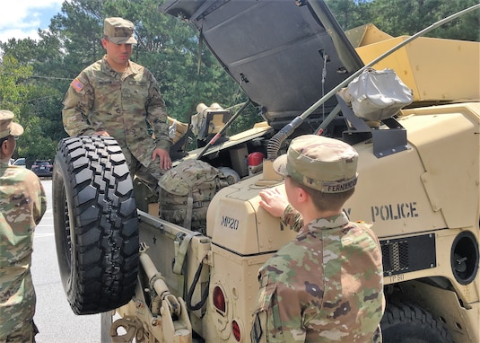 Citizen-Soldiers and Airmen from across the state of Georgia assemble and prepare to depart for hurricane response missions in Louisiana Sept. 1, 2021, in Decatur, Georgia. Units such as the Decatur-based 170th Military Polices Battalion, 201st Regional Support Group, Georgia Army National Guard pictured here have responded to Hurricanes Irma, Michael and Dorian in recent years.