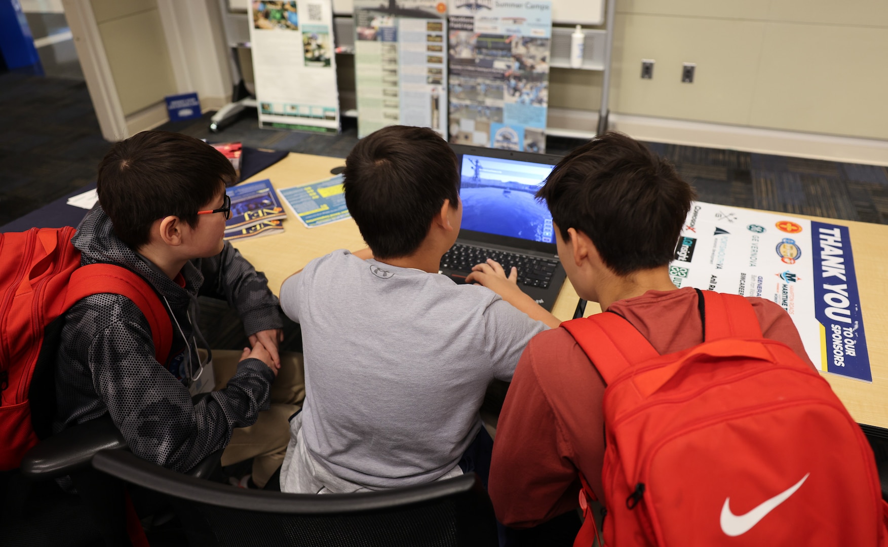 Students participating in the 15th annual Carderock Math Contest (CMC) learn naval engineering principles during a tour stop sponsored by the American Society of Naval Engineers (ASNE) at Naval Surface Warfare Center, Carderock Division