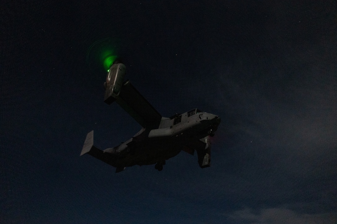 A U.S. Marine Corps MV-22B Osprey with Marine Medium Tiltrotor Squadron (VMM) 163 (Reinforced), 11th Marine Expeditionary Unit, prepares to land on the flight deck of Wasp-class amphibious assault ship USS Boxer (LHD 4) in the Pacific Ocean, Dec. 3, 2025. The 11th MEU is currently underway aboard the Boxer Amphibious Ready Group in the U.S. 3rd Fleet area of operations conducting integrated training that enhances lethality and warfighting readiness. (U.S. Marine Corps photo by Cpl. Oliver Nisbet)