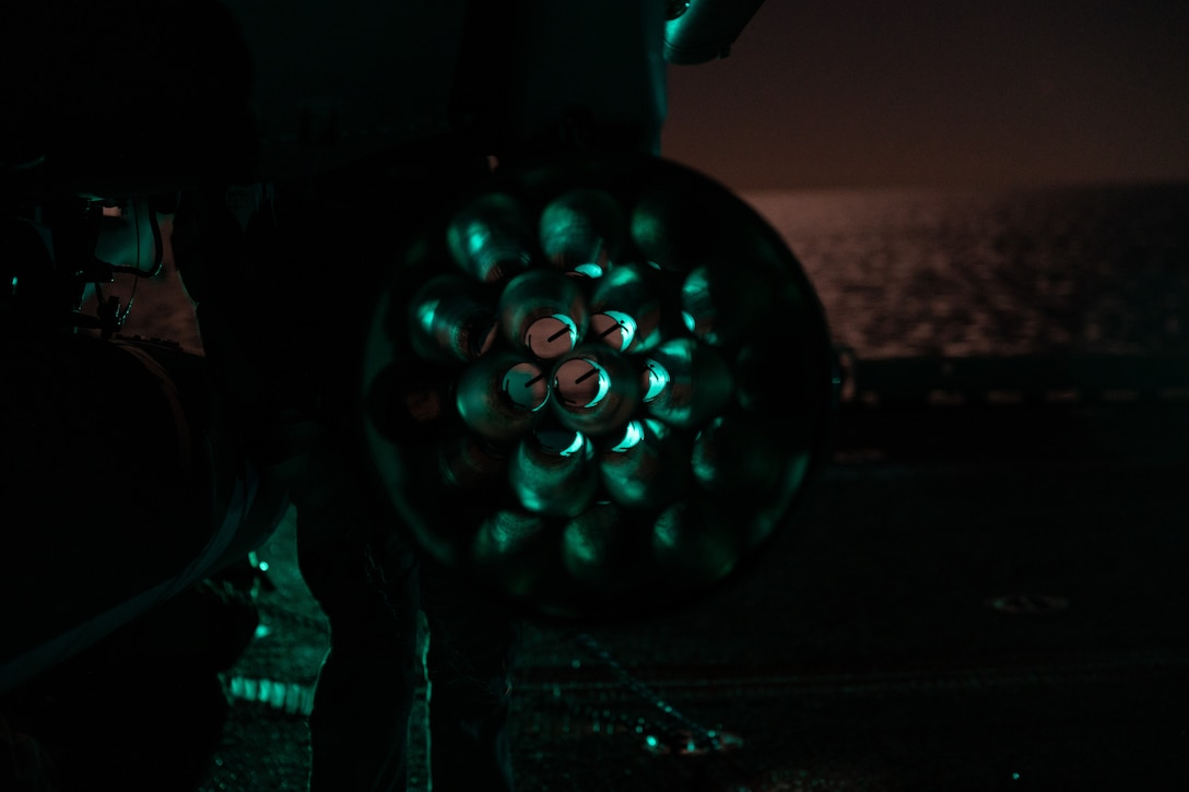 A U.S. Marine Corps UH-1Y Venom helicopter with Marine Medium Tiltrotor Squadron (VMM) 163 (Reinforced), 11th Marine Expeditionary Unit, undergoes routine maintenance aboard Wasp-class amphibious assault ship USS Boxer (LHD 4) in the Pacific Ocean, Dec. 3, 2025. The 11th MEU is currently underway aboard the Boxer Amphibious Ready Group in the U.S. 3rd Fleet area of operations conducting integrated training that enhances lethality and warfighting readiness. (U.S. Marine Corps photo by Cpl. Oliver Nisbet)