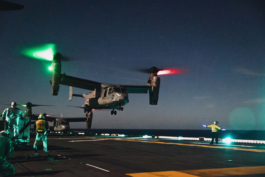 A U.S. Marine Corps MV-22B Osprey with Marine Medium Tiltrotor Squadron (VMM) 163 (Reinforced), 11th Marine Expeditionary Unit, lands on the flight deck of Wasp-class amphibious assault ship USS Boxer (LHD 4) in the Pacific Ocean, Dec. 3, 2025. The 11th MEU is currently underway aboard the Boxer Amphibious Ready Group in the U.S. 3rd Fleet area of operations conducting integrated training that enhances lethality and warfighting readiness. (U.S. Marine Corps photo by Sgt. Joseph Helms)