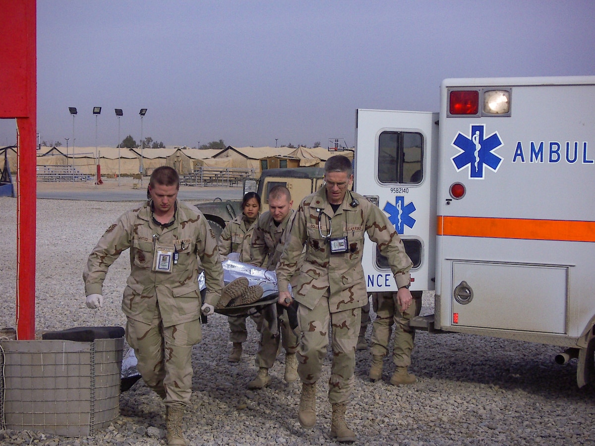 Image of Airmen carrying a patient.