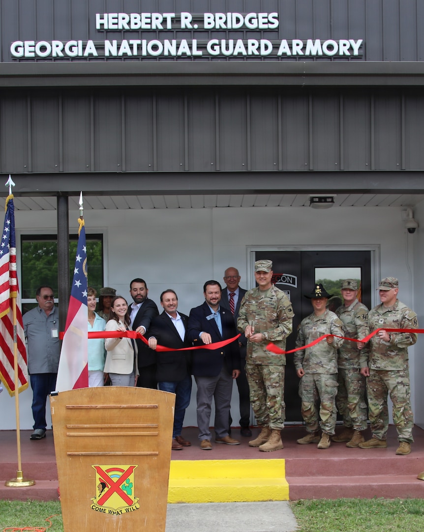 Brigadier General Jason Fryman, commander of the Georgia Army National Guard; Soldiers of the Troop A, 108th Cavalry Regiment; and citizens of Polk County, Georgia, rededicate the Cedartown armory during a ceremony May 6, 2026.