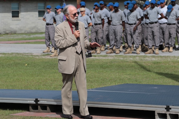 Fort Stewart, Ga., May 19, 2018 - Dr. Robert Hughes, former Fort Stewart Youth ChalleNGe Academy director, speaks to the Fort Stewart's Youth Challenge Academy Class 55 during the 25th Anniversary and All Class Reunion celebration today.  Hughes was speaking to the class about the history of the academy and the positive impact it has had on its former students.