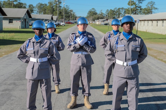 Fort Stewart, Ga., March 3, 2018 - The Georgia National Guard Youth Challenge Academy Color Guard awaits the beginning of the academy's family day activities.  Students are selected to the color guard after a rigorous assessment of their knowledge, physical fitness and leadership abilities.