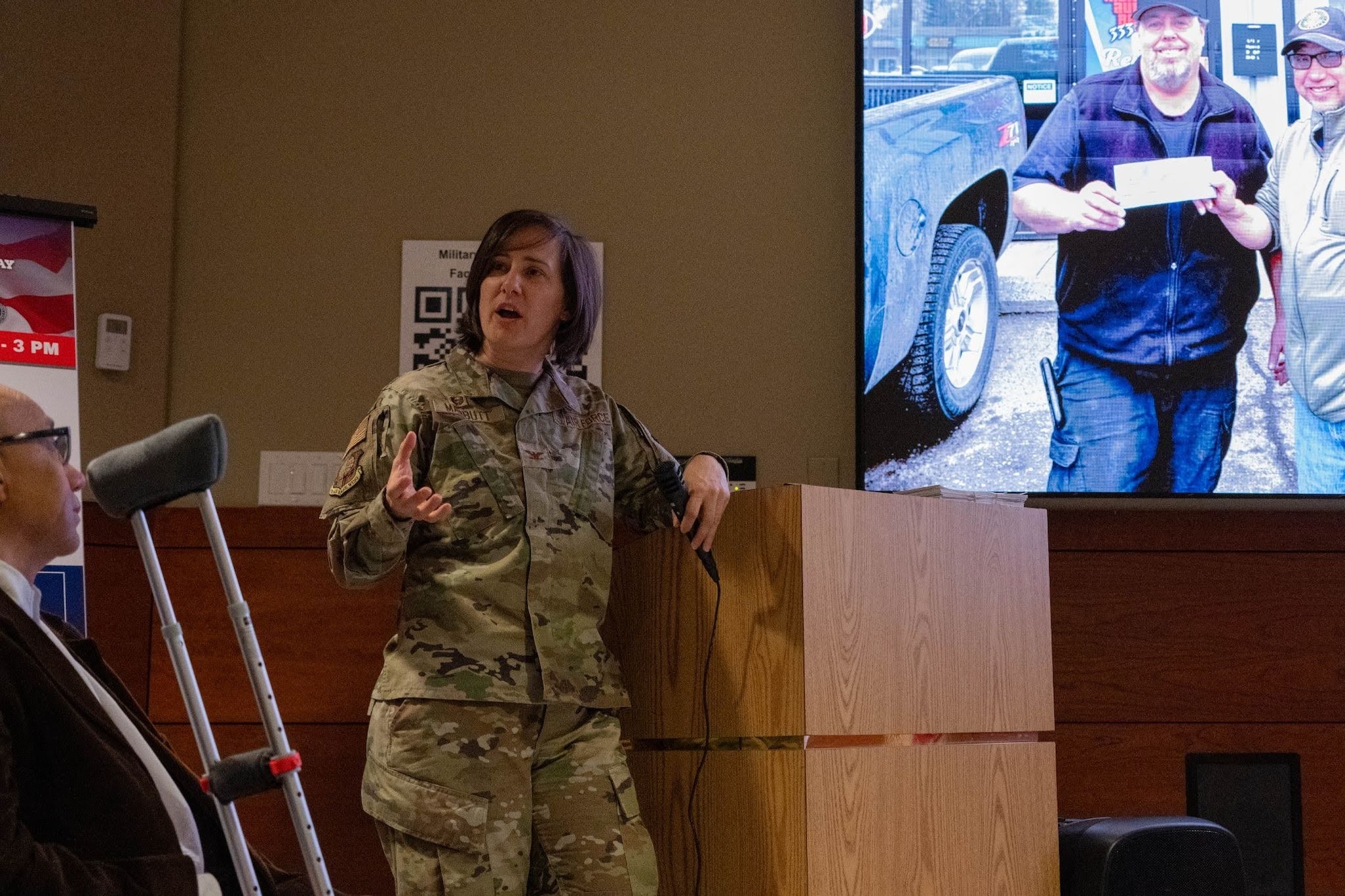 U.S. Air Force Col. Lisa Mabbutt, Joint Base Elmendorf-Richardson and 673d Air Base Wing commander, speaks during the Retiree Appreciation Day event on JBER, Alaska, May 1, 2026. The event honored retirees for their dedicated service and connected them with federal, state and local resources available to the military community. (U.S. Air Force photo by Airman 1st Class Owen Davies)