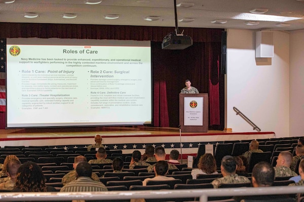 260504-N-KC192-1072 PORTSMOUTH, Va. (May 4, 2026) Lt. Cmdr. Joseph Musmanno, assigned to the Bureau of Medicine and Surgery (BUMED), gives remarks during the 2026 Medical Logistics Symposium held on board Naval Medical Center Portsmouth, May 4, 2026. The Navy Medicine Logistics Symposium aims to maintain a common operating picture and update the Medical Logistics community regarding the fiscal year 2026 Navy Medicine Campaign Order and the Navy MEDLOG goal to build a logistics system that delivers ready operational units to support the Naval Strategy. (U.S. Navy photo by Mass Communication Specialist Second Class Levi Decker)