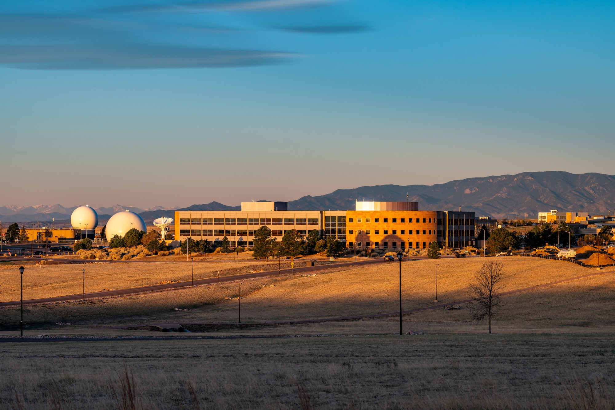 A photo of the landscape and buildings of Schriever Space Force Base.