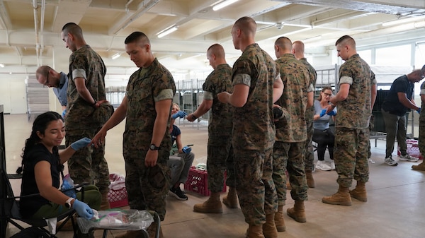 SAN DIEGO (March 31, 2026) A team of researchers from Naval Health Research Center (NHRC) perform finger-prick tests on recruits from Delta Company (7-26) at Marine Corps Recruit Depot, San Diego as part of a study examining health risks of vitamin D deficiency, and possible solutions. NHRC, part of Navy Medicine Research & Development, supports Navy, Marine Corps and joint U.S. warfighter health readiness and lethality with research and development that delivers high-value, high-impact solutions to the health and readiness challenges U.S. military population faces on the battlefield, at-sea, home and abroad. (U.S. Navy photo by Danielle Cazarez/released)
