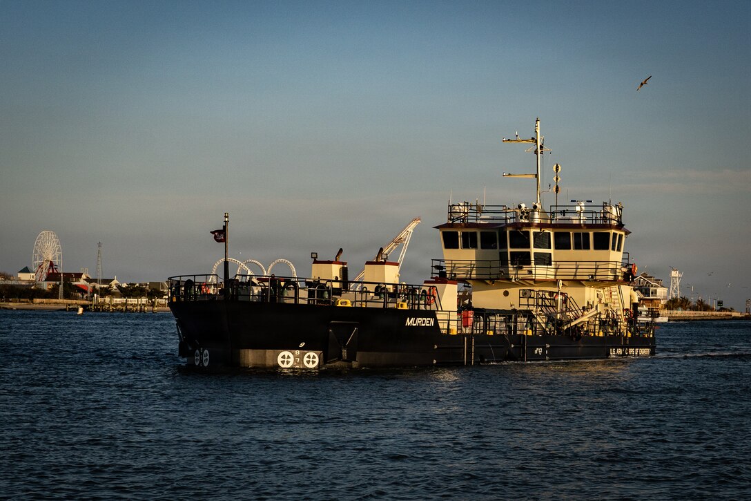 The U.S. Army Corps of Engineers dredge MURDEN removes sediment from the Ocean City Inlet, Nov. 23, 2025. The MURDEN can carry the equivalent of up to 50 dump truck loads of material and releases it by splitting its hull. (US Army photo by Jeremy Todd)