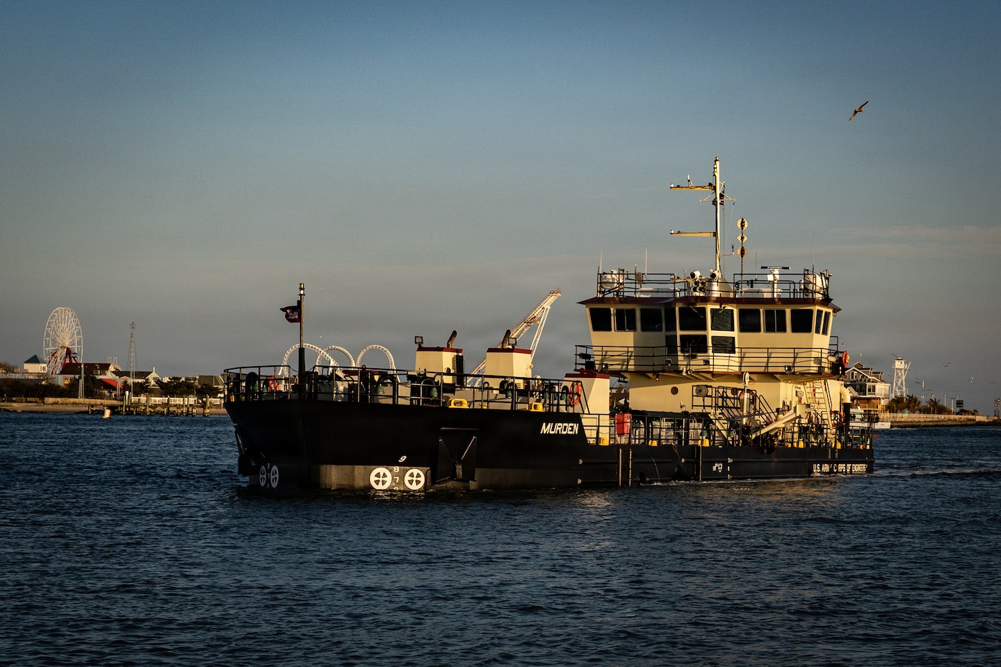 The U.S. Army Corps of Engineers dredge MURDEN removes sediment from the Ocean City Inlet, Nov. 23, 2025. The MURDEN can carry the equivalent of up to 50 dump truck loads of material and releases it by splitting its hull. (US Army photo by Jeremy Todd)