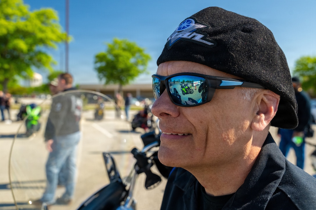 A guy wearing sunglasses.