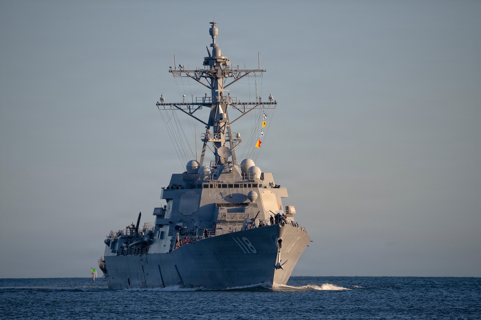 The Arleigh Burke-class guided-missile destroyer USS Daniel Inouye (DDG 118) returns to Pearl Harbor on April 23, 2026.