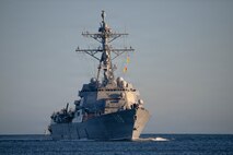 The Arleigh Burke-class guided-missile destroyer USS Daniel Inouye (DDG 118) returns to Pearl Harbor on April 23, 2026.
