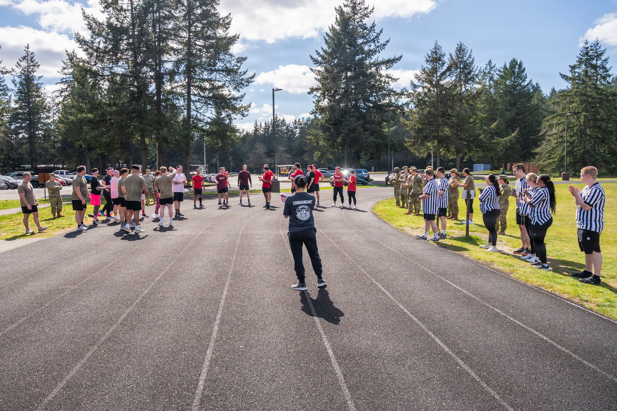 Julius A. Kolb Airman Leadership School Commandant’s Crucible participants and supporters prepare for the opening event at Joint Base Lewis-McChord, Washington, April 7, 2026.